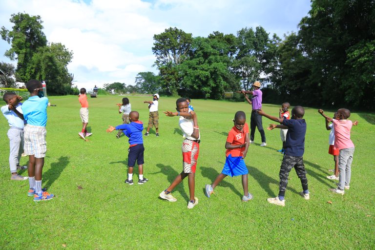 Golf Students in Uganda learning the game